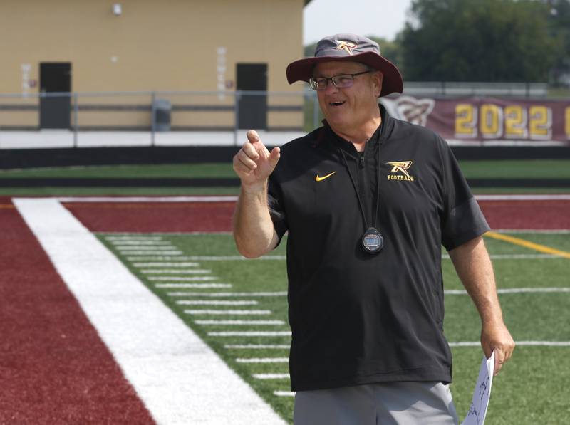 Richmond-Burton coach Mike Noll talks to his players during a 7 on 7 football practice Monday, July 14, 2025, at Richmond-Burton High School, with teams from Crystal Lake Central.  Grayslake Central and Mundelein.