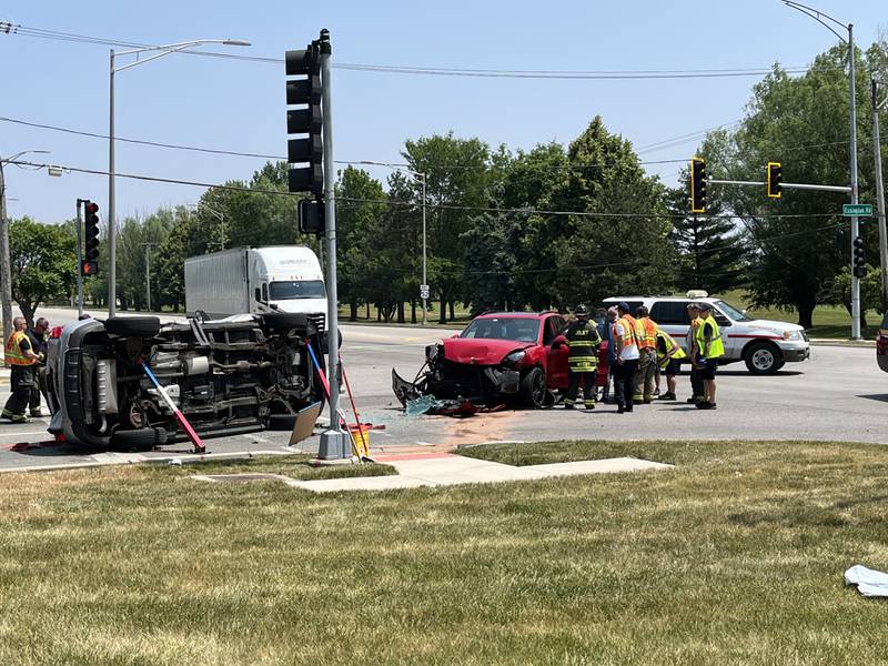 Emergency crew respond to a crash at the intersection of Essington and Jefferson streets on Tuesday, June 20, 2023 in Joliet.