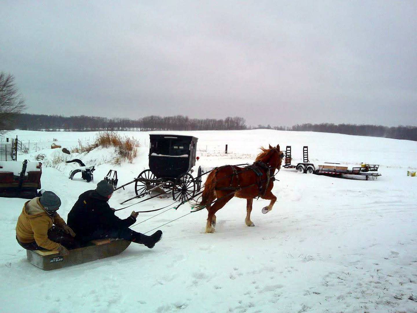 The Eichers enjoy fun in the snow.