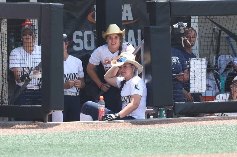Several Lemont players wear cowboy hats in the dugout during the game against Antioch in the Class 3A state championship game on Saturday, June 10, 2023 in Peoria.