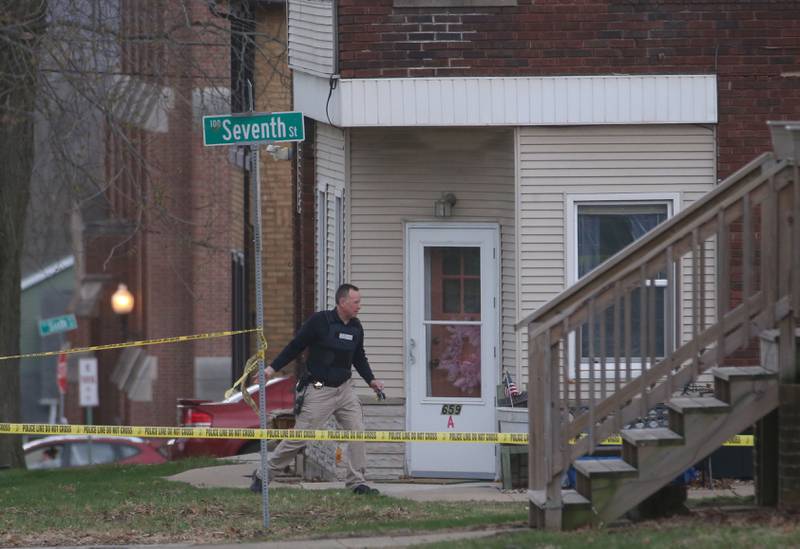 La Salle Poice chief Mike Smudzinski walks in front of a two story apartment building on the corner of Seventh and Charters on Sunday, March 30, 2025 in La Salle. A barricaded armed subject fired shots at officers. Police from across the Illinois Valley assisted in the incident.