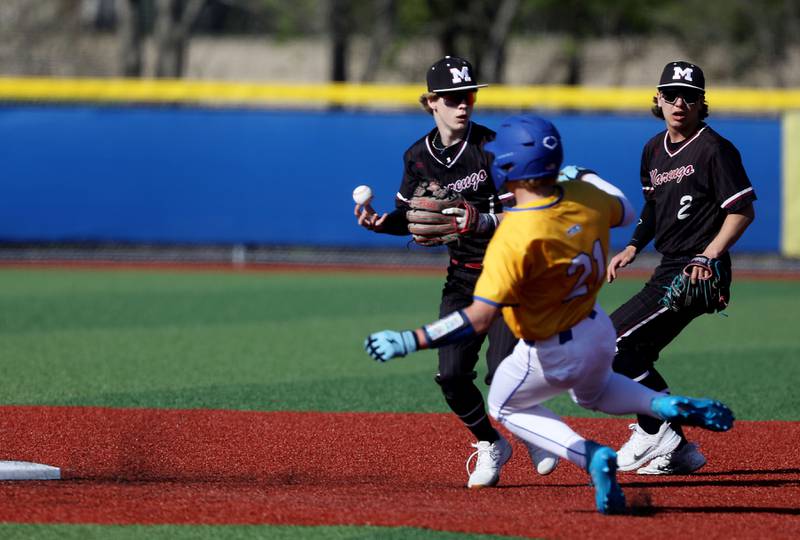 Marengo's Dane Kowalski loses the ball as he tries to turn a double play as Johnsburg's Jack Thompson slides into second base during a Kishwaukee River Conference baseball game on Wednesday, April 22,2026, at Johnsburg High School.