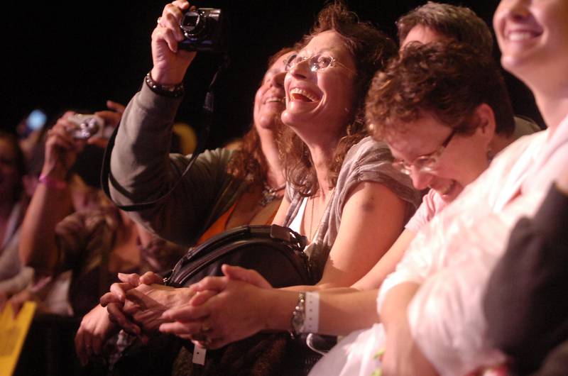 Fans sing along to Trace Adkins as he performed at the Concerts for a Cause series on Saturday, June 25, 2011 at the Illinois Valley Regional Airport in Peru.