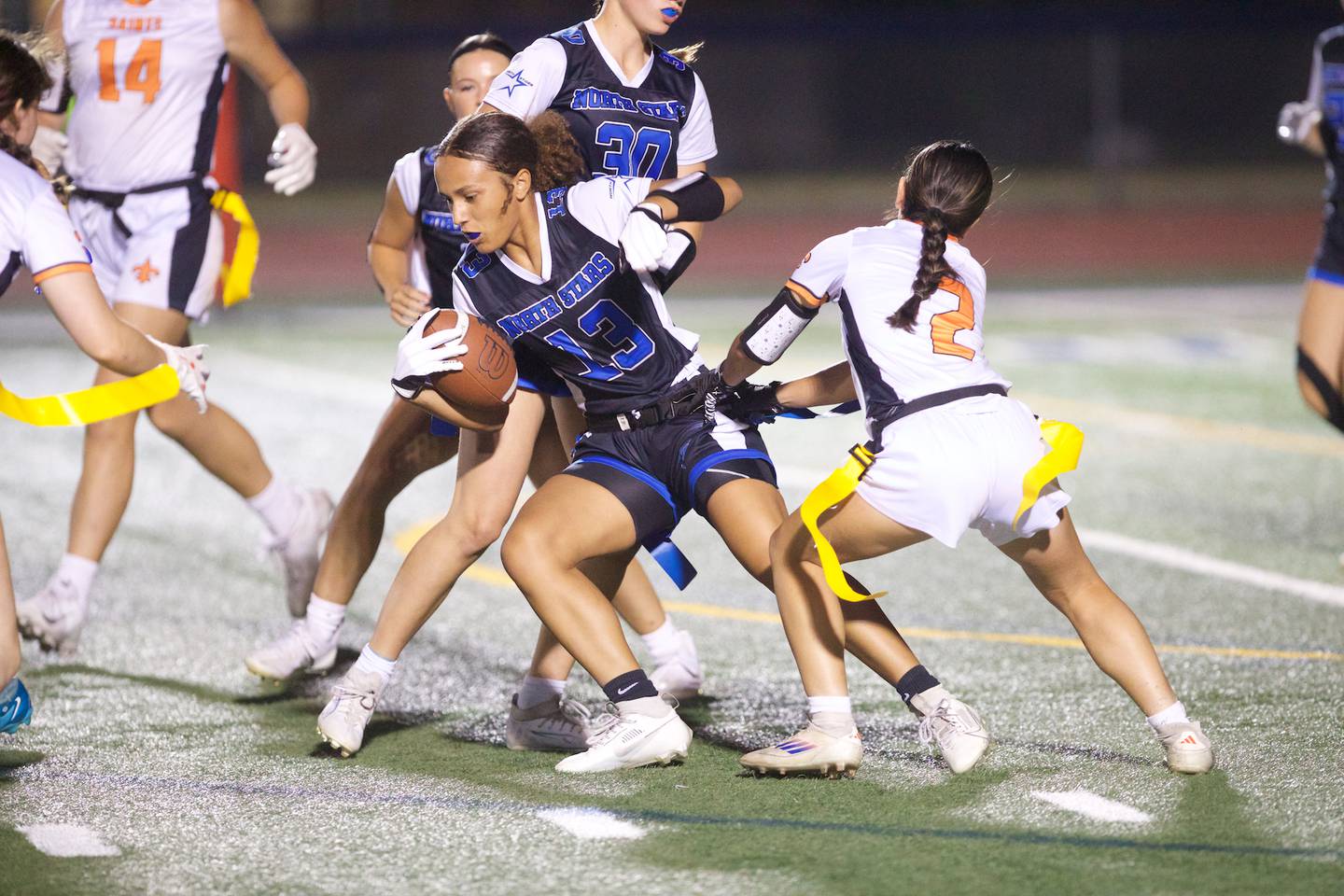 St. Charles North's  Alexandria Richardson is stopped by St. Charles East's Erini Vardalos on Monday, September 29, 2025 in St. Charles.