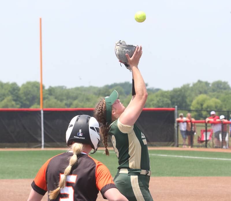 St. Bede's third baseman Reagan Stoudt makes a catch as Illini Bluff's McKenzie Nutter stays on third base in the Class 1A State championship game on Saturday, June 3, 2023 at the Louisville Slugger Sports Complex in Peoria.