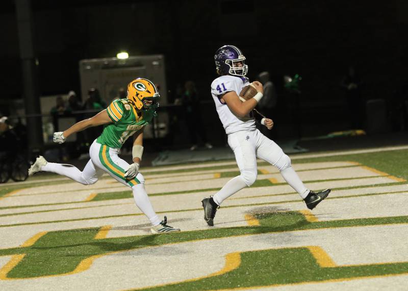 Rochelle's Tyler Gensler (21) runs in for a touchdown during Friday's game at Geneseo.