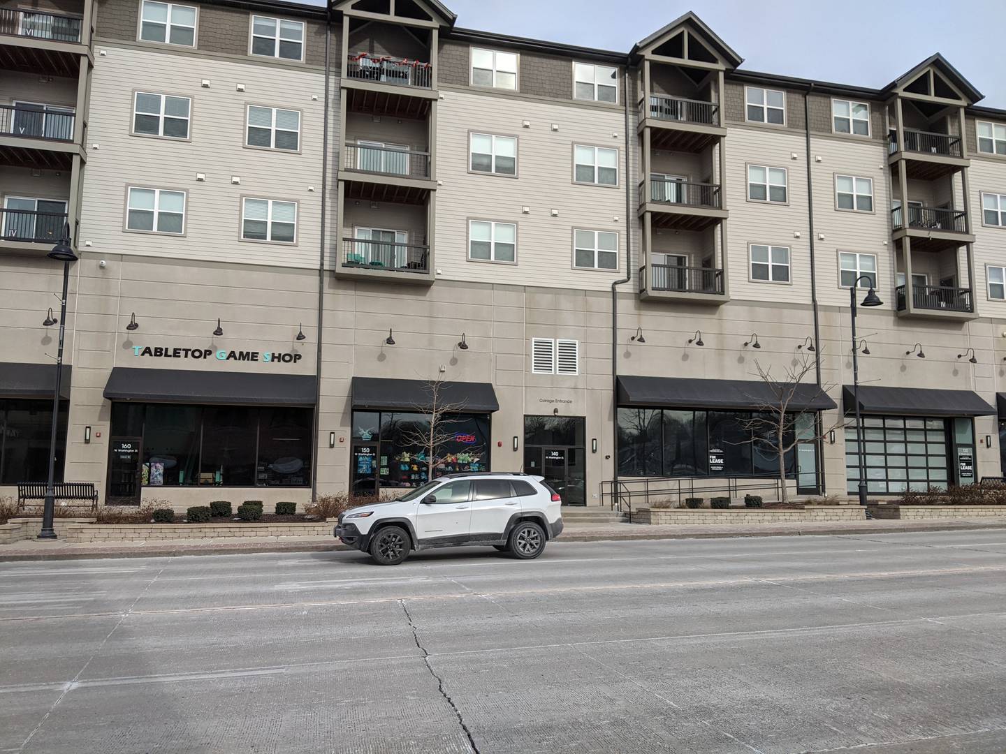 As the Shodeen Group gets ready to start construction on the second building for The Reserve at Hudson Crossing luxury apartment complex in downtown Oswego, village trustees have raised the question of why the majority of the commercial space on the building’s ground level remains vacant.