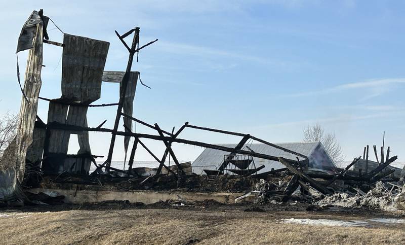 The charred remains of a barn is all that is left standing Saturday, Feb. 22, 2025 following a fire on Haldane Road, near the intersection of Illinois 26, north of Polo.