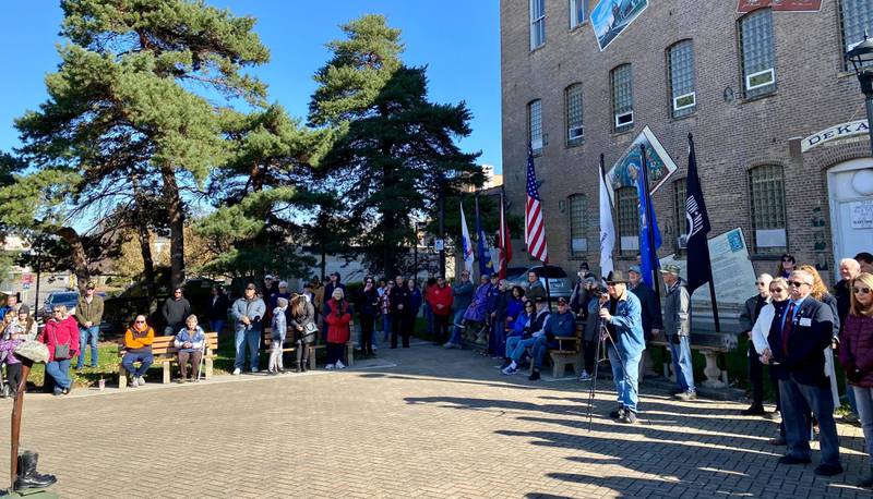 A crowd of almost 100 people gathered at First Street and Lincoln Highway in downtown DeKalb's Memorial Park Saturday, Nov. 11, 2023 for an annual Veterans Day ceremony hosted by the DeKalb American Legion Post No. 66.