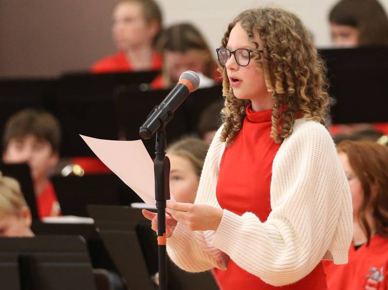 Emcee Ryan Owczarek introduces the choirs during the annual Veterans Day Program on Monday, Nov. 11, 2024 at Parkside Middle School in Peru.