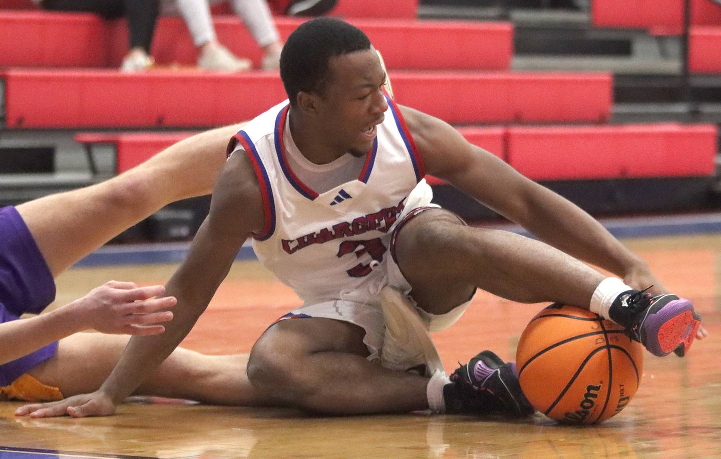 Dundee-Crown’s Kadin Malone gathers the ball against Wauconda in varsity basketball Friday, Dec. 20, 2024 at Dundee-Crown High School in Carpentersville.
