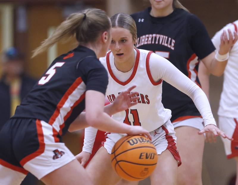Huntley's Anna Campanelli (left) guards Libertyville's Elinor Lindal as he brings the ball up the court during the IHSA Class 4A Huntley Sectional Championship girls basketball game on Thursday, Feb. 27, 2025, at Huntley High School.