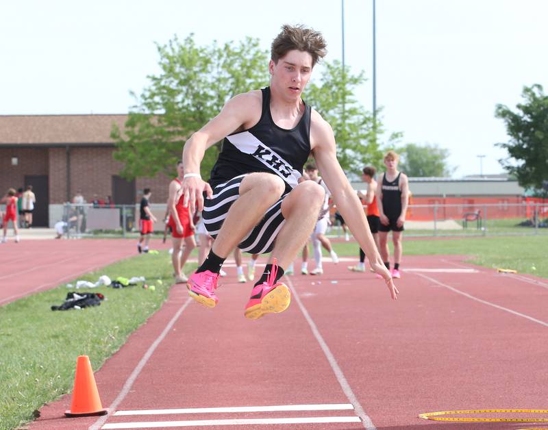 Kaneland's Anthony Rrban does the long jump during the I-8 Boys Conference Championship track meet on Thursday, May 11, 2023 at the L-P Athletic Complex in La Salle.