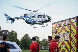 Woman seriously injured exiting vehicle on road Friday in Woodstock 