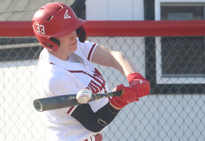 Streator's Joe Hoekstra makes contact with the ball while facing Hall on Thursday, March 19, 2026 at Streator High School.