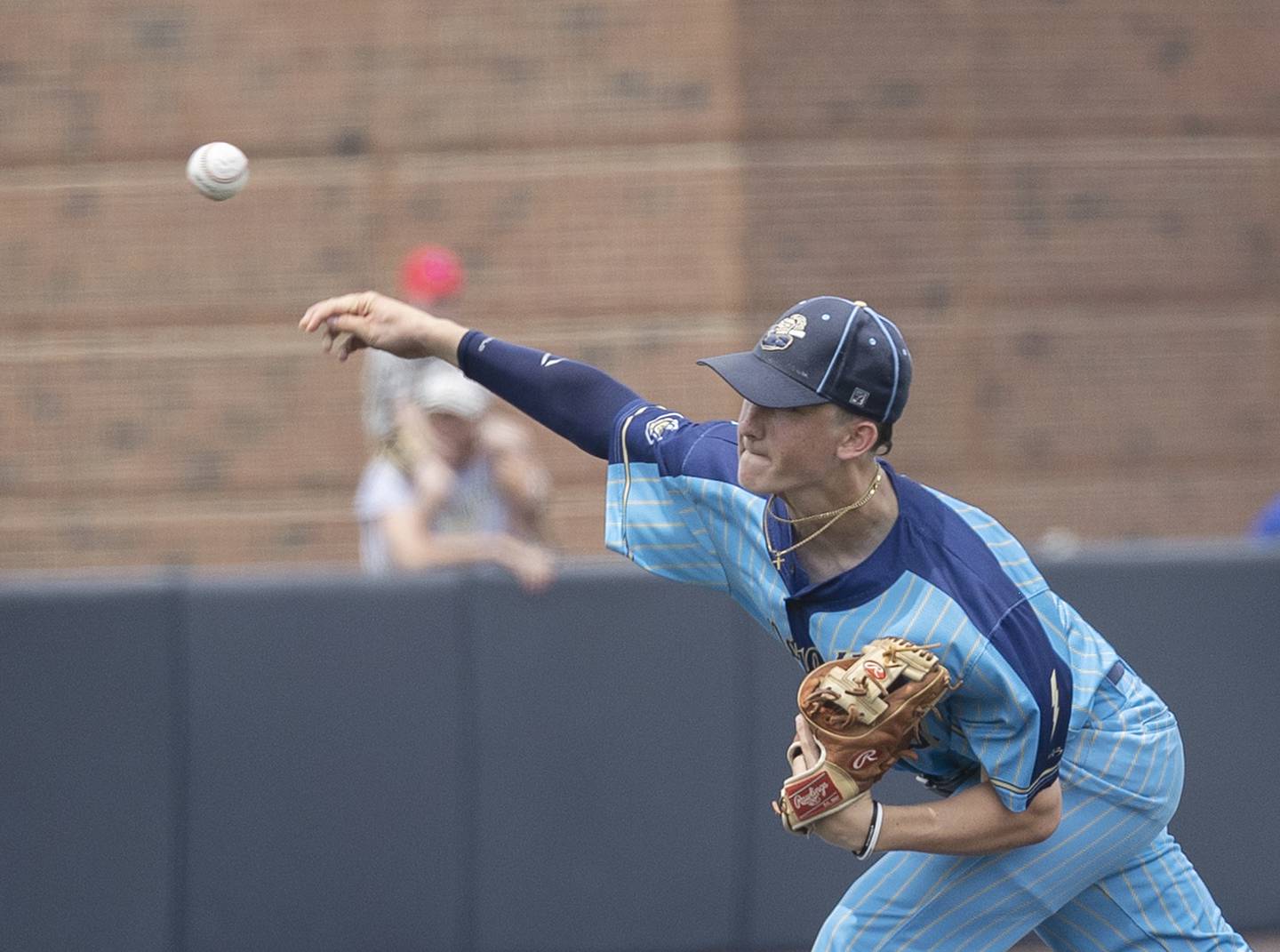 Ottawa Marquette’s Griffin Dobberstein fires a pitch against Father McGivney Saturday, June 7, 2025, during the Class 1A state baseball final at Illinois Field in Champaign.