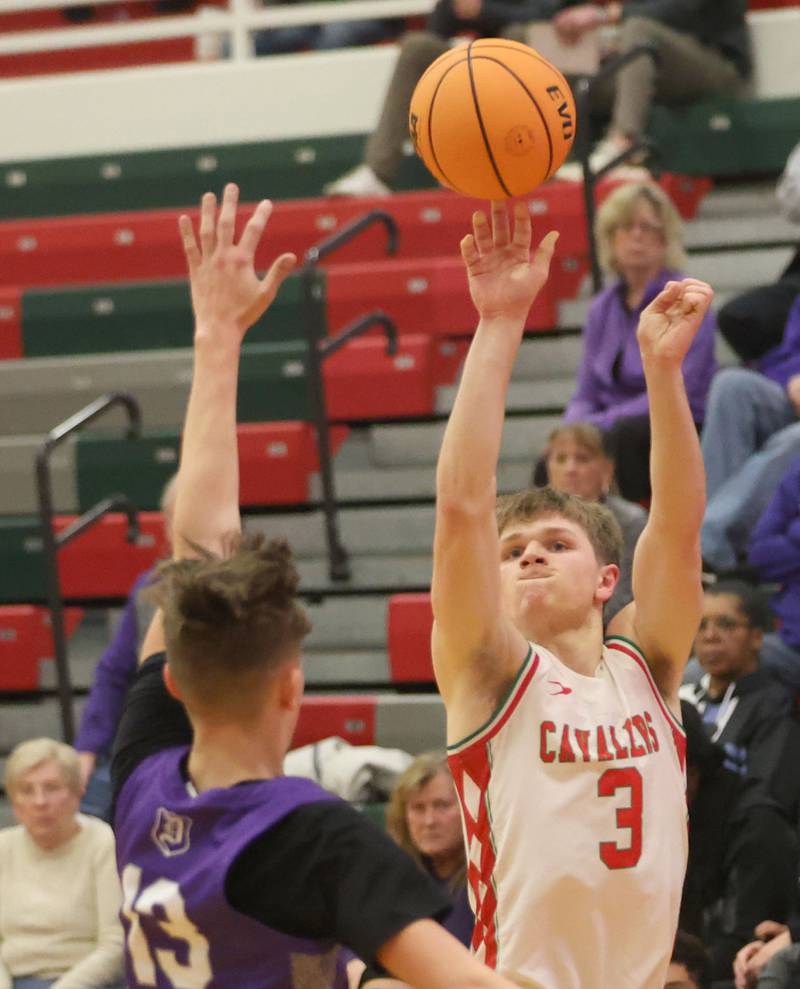 L-P's Braylin Bond fires a jump shot over Dixon's Beckham Rock during the Class 3A Regional semifinal game on Wednesday, Feb. 25, 2026 in Sellett Gymnasium at L-P High School.