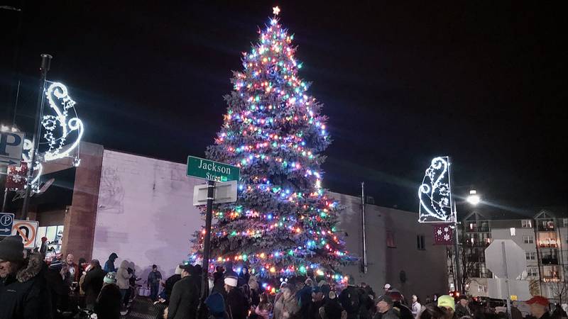Hundreds of people filled the streets at the corner of Main and Jackson Streets to witness the tree lighting ceremony during the annual Christmas Walk in downtown Oswego on Friday, Dec. 2 2022.
