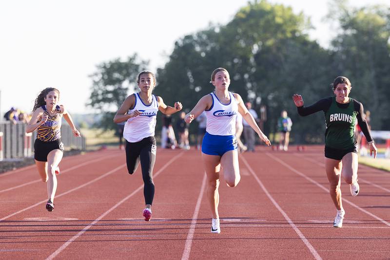 Newman’s Elaina Allen (right) and Paizlee Williams took first and second in the 100 dash Wednesday, May 13, 2026, during the Class 1A Erie Sectional meet.