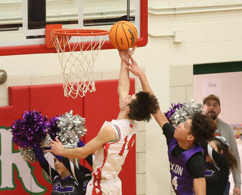 L-P's Wyatt Kilday drives to the hoop as he is fouled by Dixon's Armahn Mcgowan on Tuesday, Jan. 20, 2026 in Sellett Gymnasium at L-P High School.