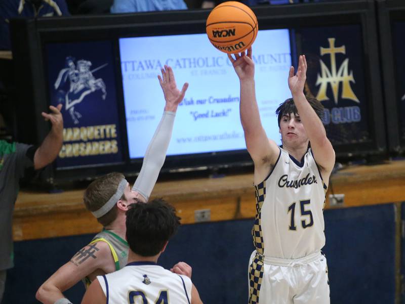 Marquette's Alec Novotney lets go of a jump shot over Seneca's Paxton Giertz on Friday, Feb. 21, 2025 in Bader Gym at Marquette Academy.