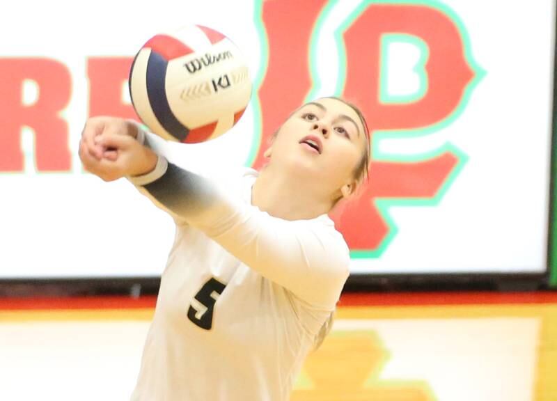 Sycamore's Kylie Walsh returns a serve from L-P on Tuesday, Oct. 15, 2024 in AJ Sellett Gymnasium at L-P High School.