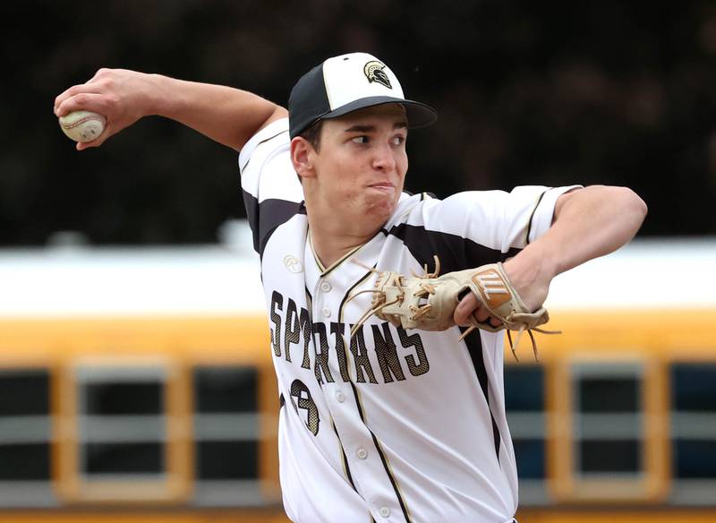 Sycamore's Cal Harbecke delivers a pitch Thursday, May 29, 2025, during their Class 3A regional semifinal game against Dixon at Freeport High School.