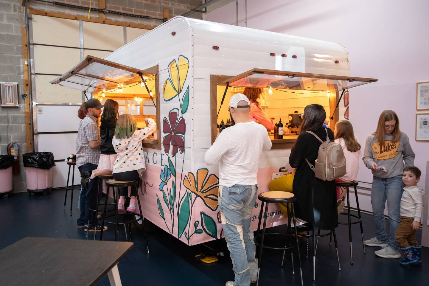 Tilly, Illuminate Space's "new team member," is a repurposed vintage camper made into a mobile candle bar.