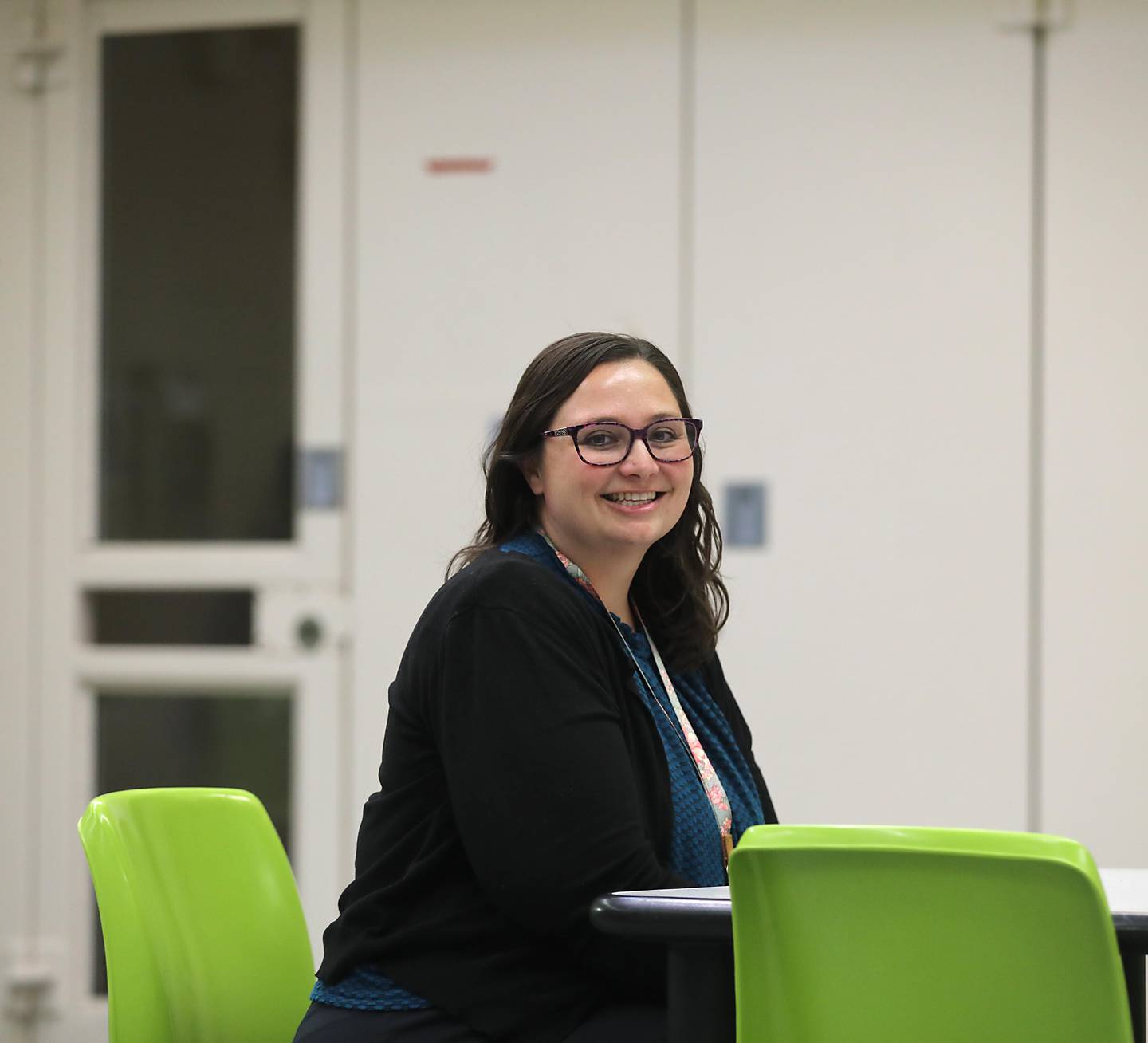 BreeAnn Kaczmarczyk, a licensed social worker at Thresholds,, inside a McHenry County Jail day room on Monday Dec. 8, 2025, in Woodstock, Jail inmates found to be unfit for trial now receive specialized care in the McHenry County jail while they wait for a bed in an Illinois Department of Human Services facility. Typically, such detainees would not receive the needed level of care they need to return to fitness until they were admitted into a mental health facility. This program is the result of an intergovernmental partnership between McHenry County Sheriff’s Office,  IDHS/Division of Behavioral Health & Recovery and Thresholds.