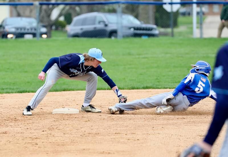 Bureau Valley second baseman Carter Salisbury tags out Princeton's Ace Christiansen on a stole base attempt in Monday's game at Princeton.