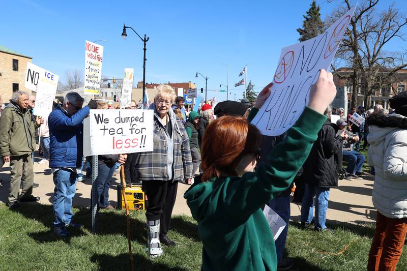 Linda Viall, of Manteno, participates in the No Kings rally at the Kankakee County Courthouse despite needing a walking boot on March 28, 2026.