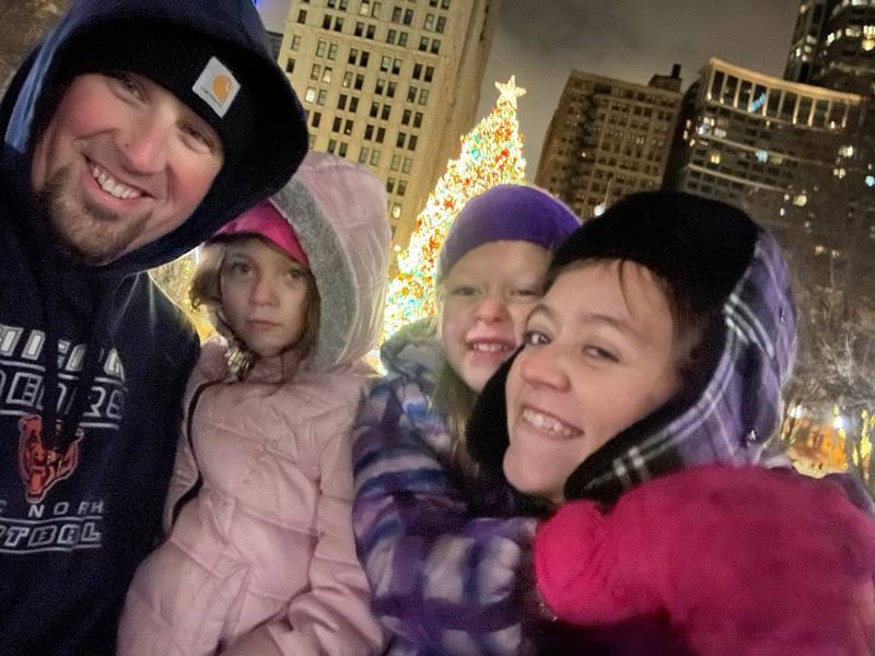 Jeremy and Krista Velmont with their two daughters. The family is recuperating after losing their Crystal Lake home and four pets in a fire over Memorial Day weekend.