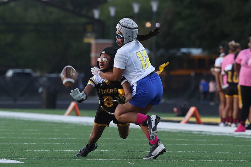 Joliet West’s London Clemons draws the pass interference against Joliet Central’s April Ortiz on Wednesday, Oct. 2, 2024 in Joliet.
