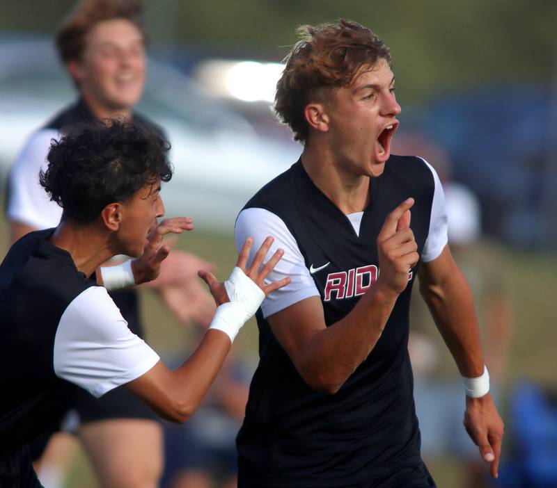 Prairie Ridge’s Henry Knoll celebrates after scoring against Crystal Lake South in varsity soccer on Thursday, Sept. 19, 2024, at Prairie Ridge High School in Crystal Lake.