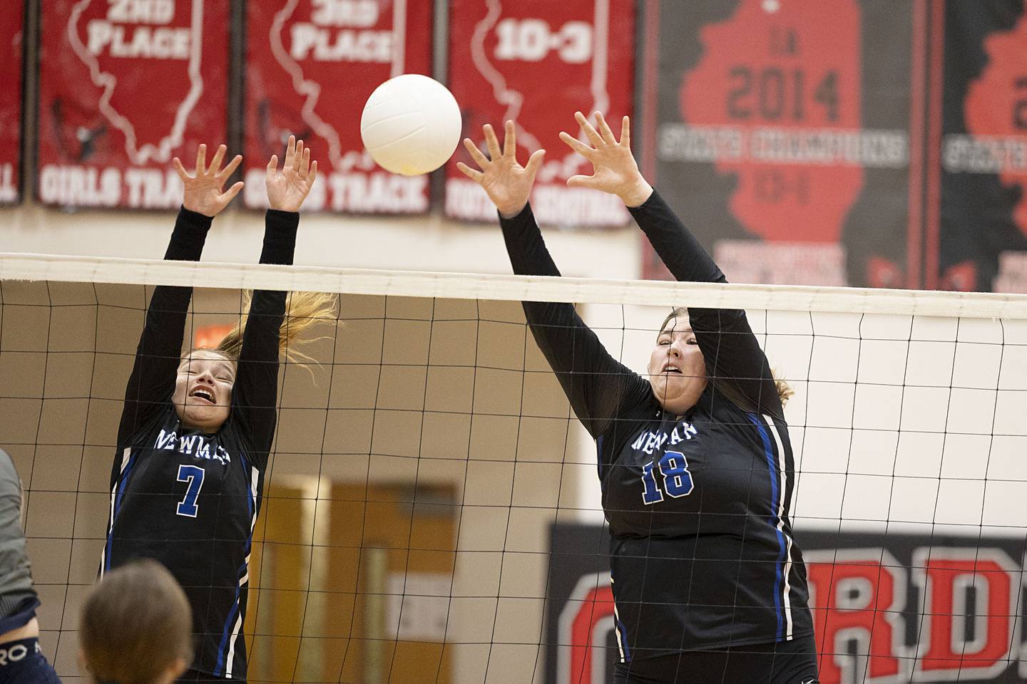Newman’s Makenzie Duhon (left) and Newman’s Kennedy Rowzee go up to block a shot Wednesday, Nov. 2, 2022 in the sectional championship game against River Ridge.