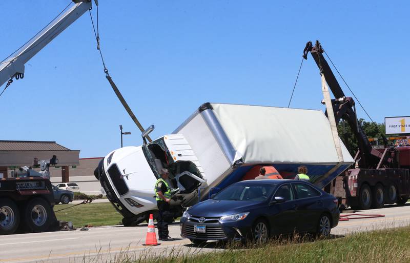 Crews work the scene of a semi truck crash on Friday, June 14, 2024 near the intersection of 38th Street and Illinois 251 in Peru. A Goodwill semi truck overturned and extrication was needed. The crash happened shortly before 11:30a.m. Illinois Route 251 was down to one lane. Peru police believe injuries were not serious.