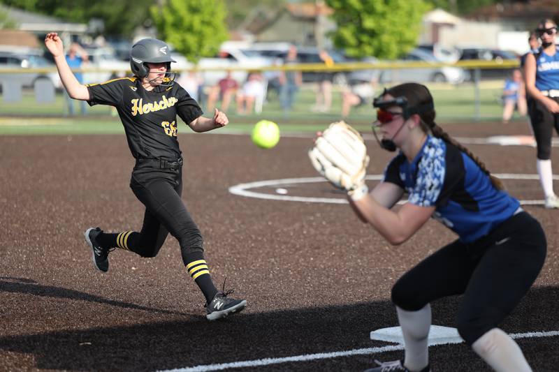 Herscher's Audrey Hoffman arrives safely at third base as the throw comes in during the Tigers' 13-6 victory against Central on Wednesday, May 14, 2025.