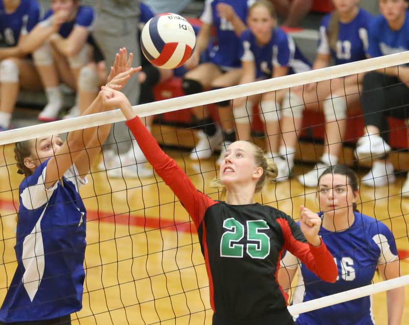 Princeton's Keighley Davis blocks a spike from L-P's Addison Urbanski as Mariska Mount looks on on Tuesday, Aug. 22, 2023 in Sellett Gymnasium.