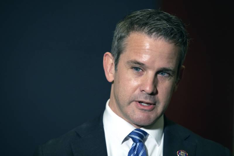 FILE - In this May 12, 2021 file photo, Rep. Adam Kinzinger, R-Ill., speaks to the media at the Capitol in Washington. House Speaker Nancy Pelosi said Sunday, July 25 she intends to name Kinzinger to a congressional committee investigating the violent Jan. 6 Capitol insurrection, pledging that the panel will “find the truth” even as the GOP threatens to boycott the effort.