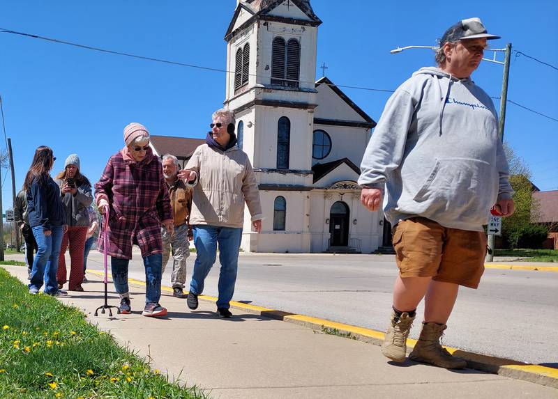 The Streator Walking Club makes its way around City Park on Sunday, April 21, 2024.