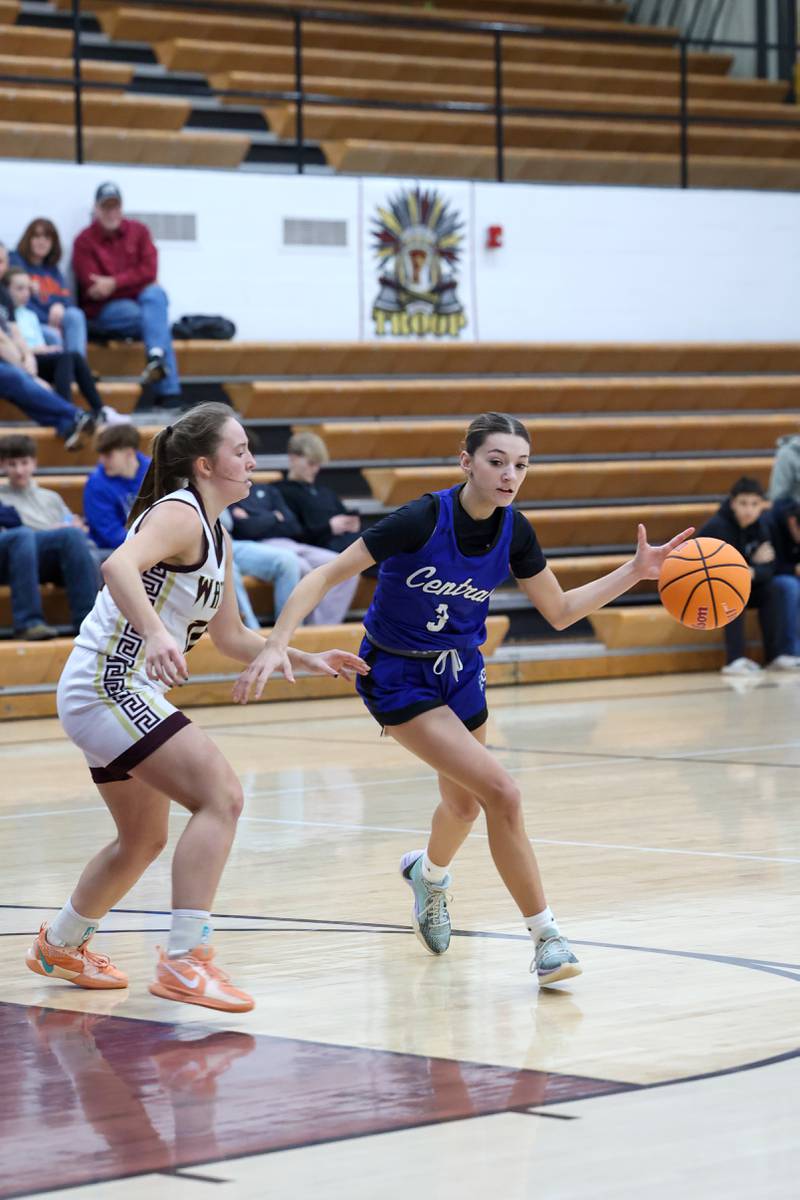 Clifton Central's Emma Koch drives to the basket against Watseka-Milford's Christa Holohan during the Warriors' 60-49 victory over Clifton Central on Saturday, Jan. 10, 2026.