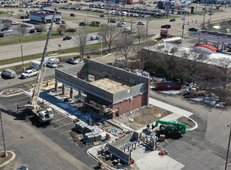 Crews work on moving materials in place on the site of a future Chipotle Mexican Grill on Wednesday, March 18, 2026 in Ottawa. The Ottawa City Council approved the project last June, and the construction has been ramping up this month.