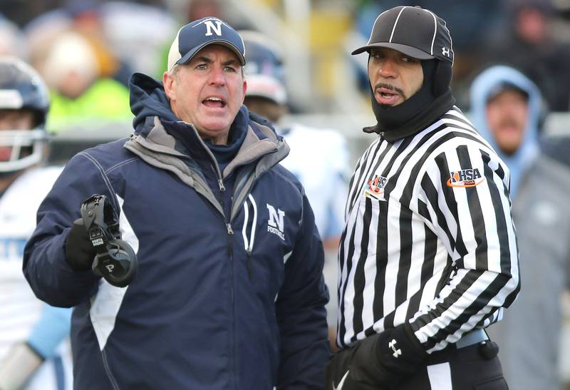 Nazareth's head coach Tim Racki disagrees with an officials call Saturday, Nov. 18, 2022, during the state semifinal game at Sycamore High School.