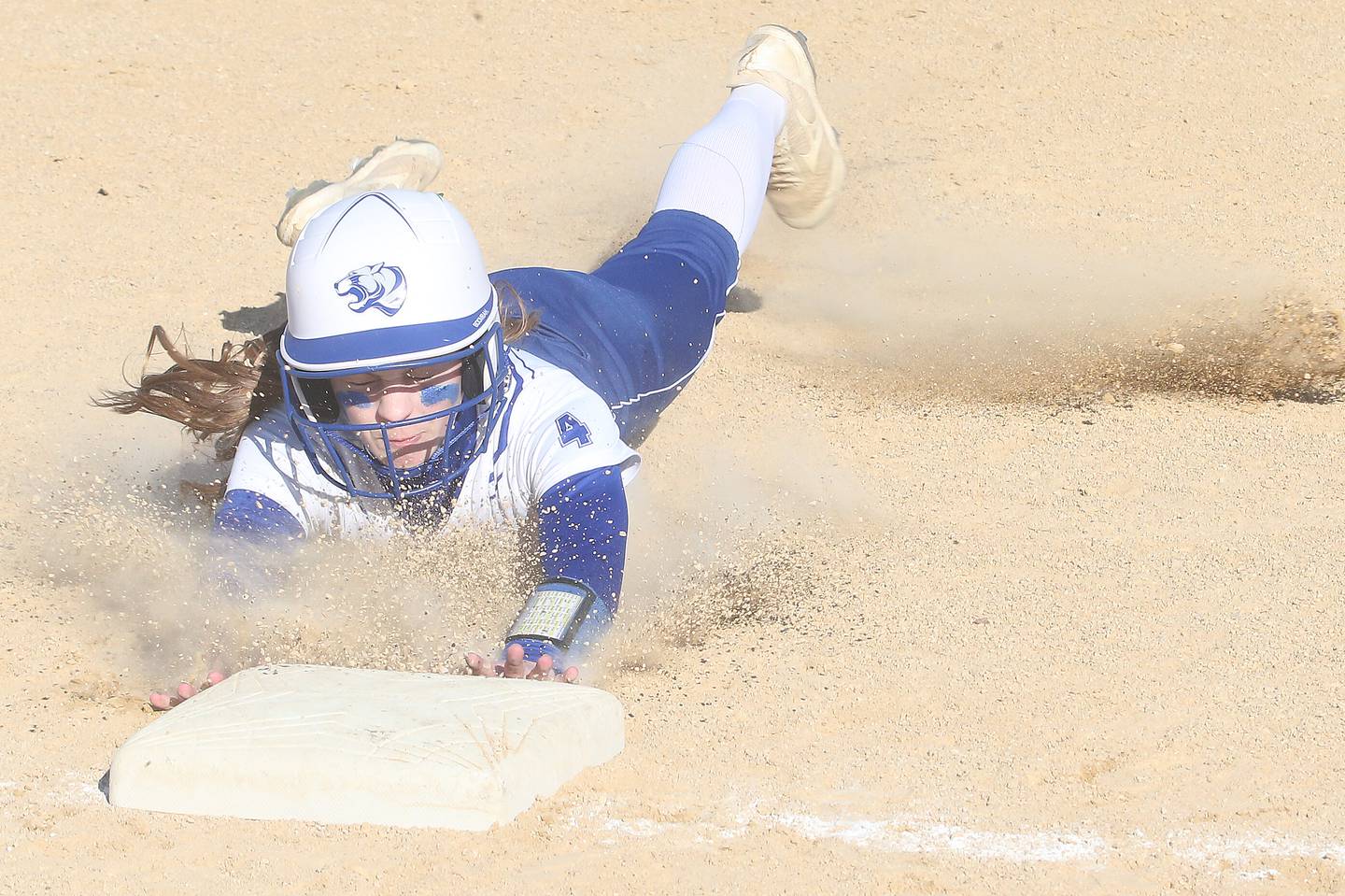 Princeton's Caroline Keutzer slides into third base on Tuesday, March 19, 2024 in Princeton.
