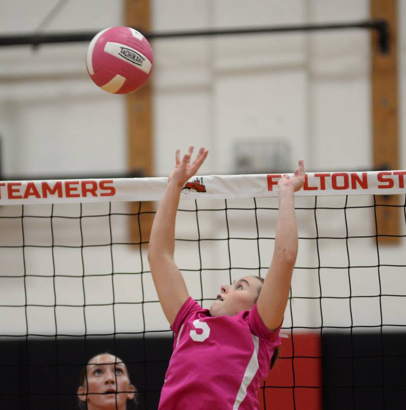 Fulton's Brianne Brennan sets the ball against Eastland during a Tuesday, Oct. 7, 2025 match in Fulton.