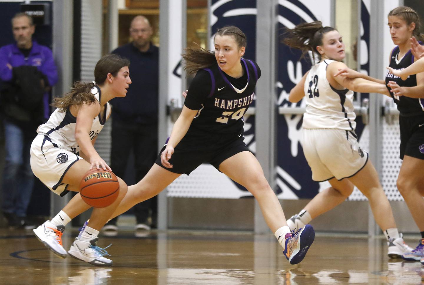 Cary-Grove's Kennedy Manning brings the ball up the court against Hampshire's Whitney Thompson during a Fox Valley Conference girls basketball game Friday, Dec.2, 2022, between Cary-Grove and Hampshire at Cary-Grove High School in Cary.