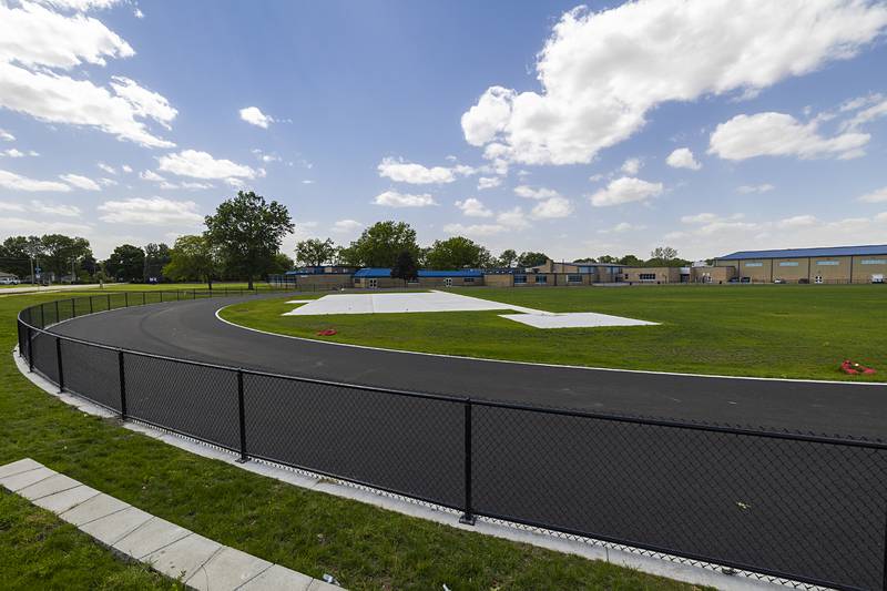 Work continues on a track at Challand Middle School in Sterling on Thursday, June 6, 2024. The track is just one of many construction projects happening this summer for the school district.