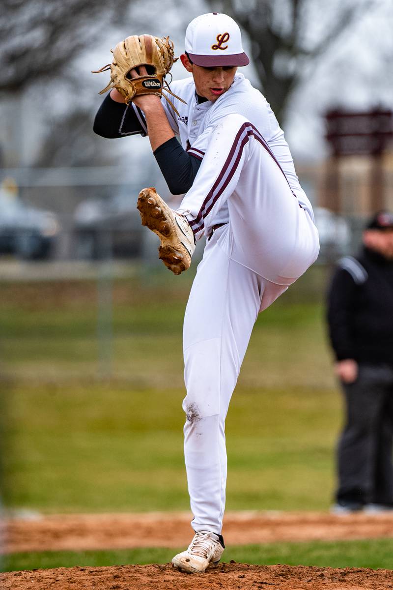 Lockport's Dylan Nagle fires a pitch during a game against  Joliet Catholic Academy Friday March 24, 2023 at Flink Field in Lockport