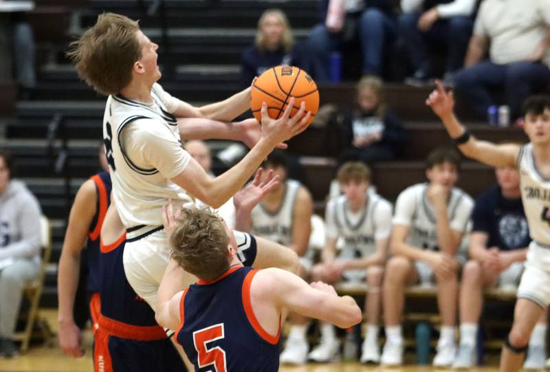 Cary-Grove’s AJ Berndt heads for the hoop against Naperville North in varsity boys basketball Hinkle Holiday Classic action on Monday, Dec. 21, 2025, at Jacobs High School in Algonquin.