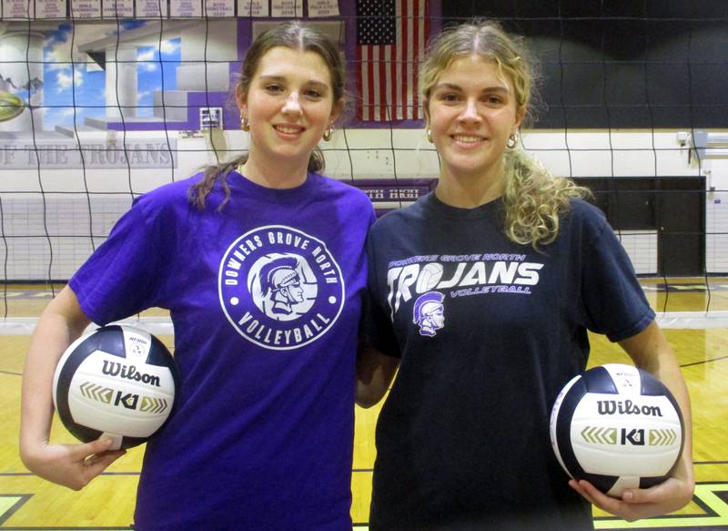 Junior middle hitter Nora Benjamins (left) and senior outside hitter Jenny Buehler are two big reasons why Downers Grove North is undefeated in the West Suburban Silver heading into this week and earned the No. 1 seed in the Class 4A Willowbrook Sectional.